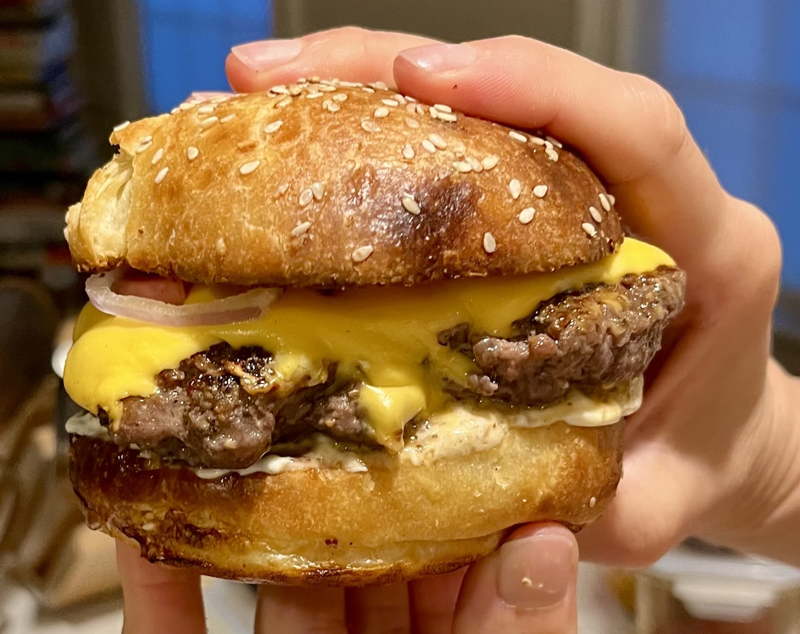 A burger bun and cheeseburger, one of the practice's variations