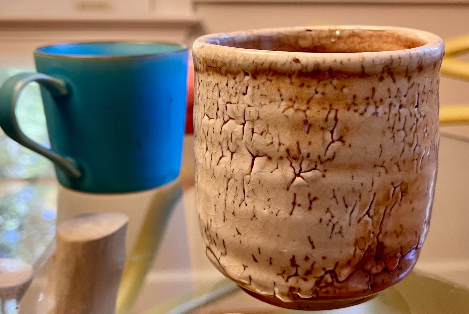 Two handmade ceramic pieces brought home from travels