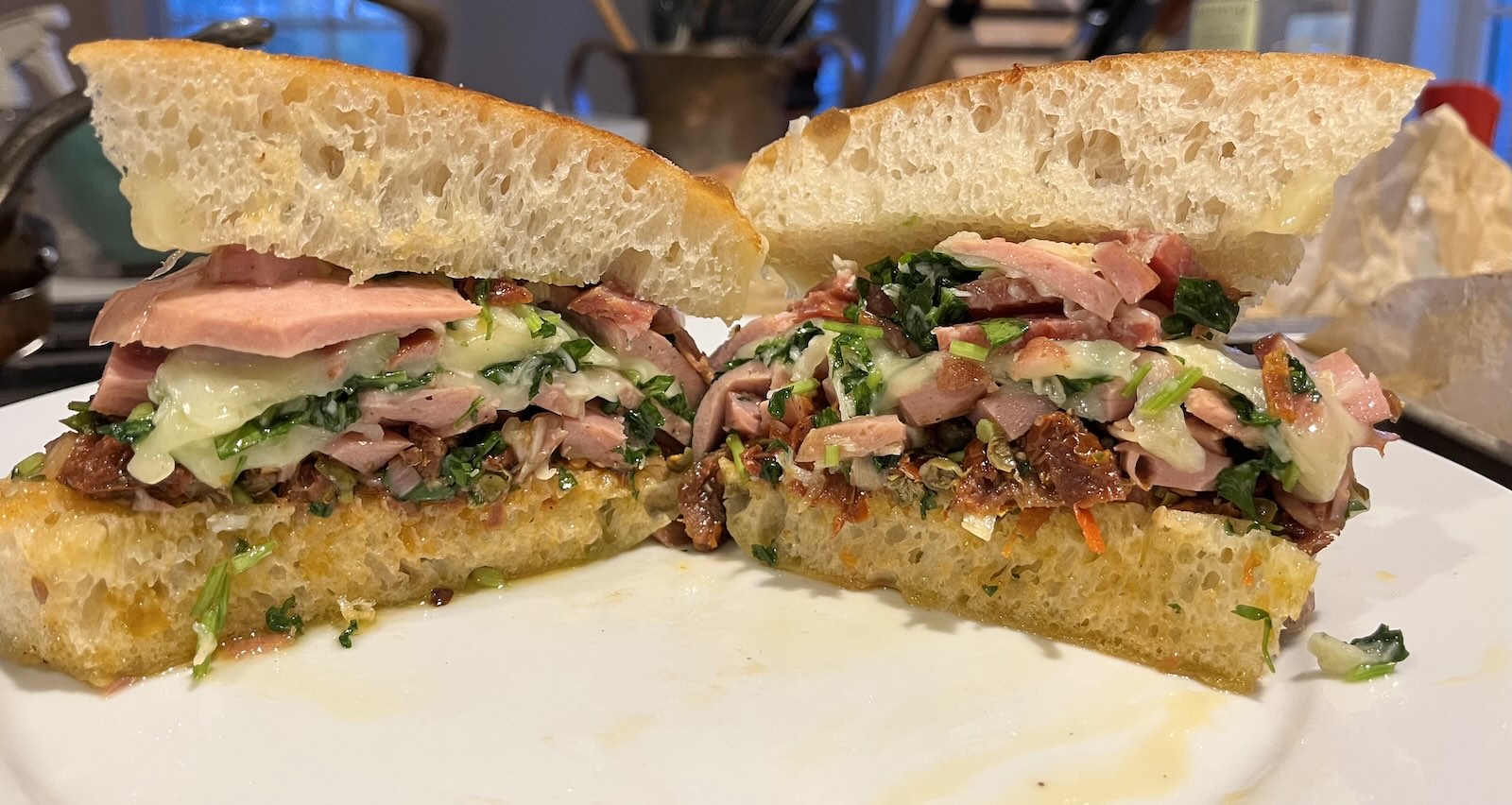 A focaccia sandwich with a lot of fillings
